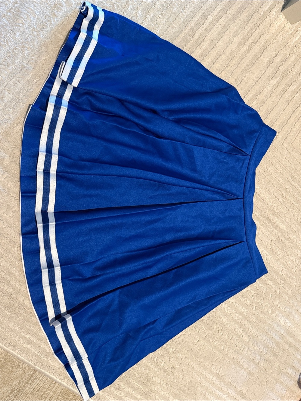 Blue Pleated Tennis Skirt with White Stripe Zipper on Side